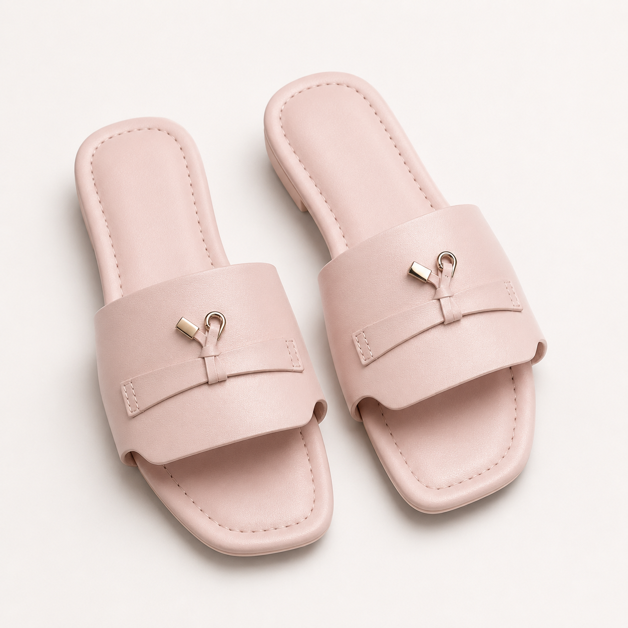 Rosa Sandalen mit goldenen Details
